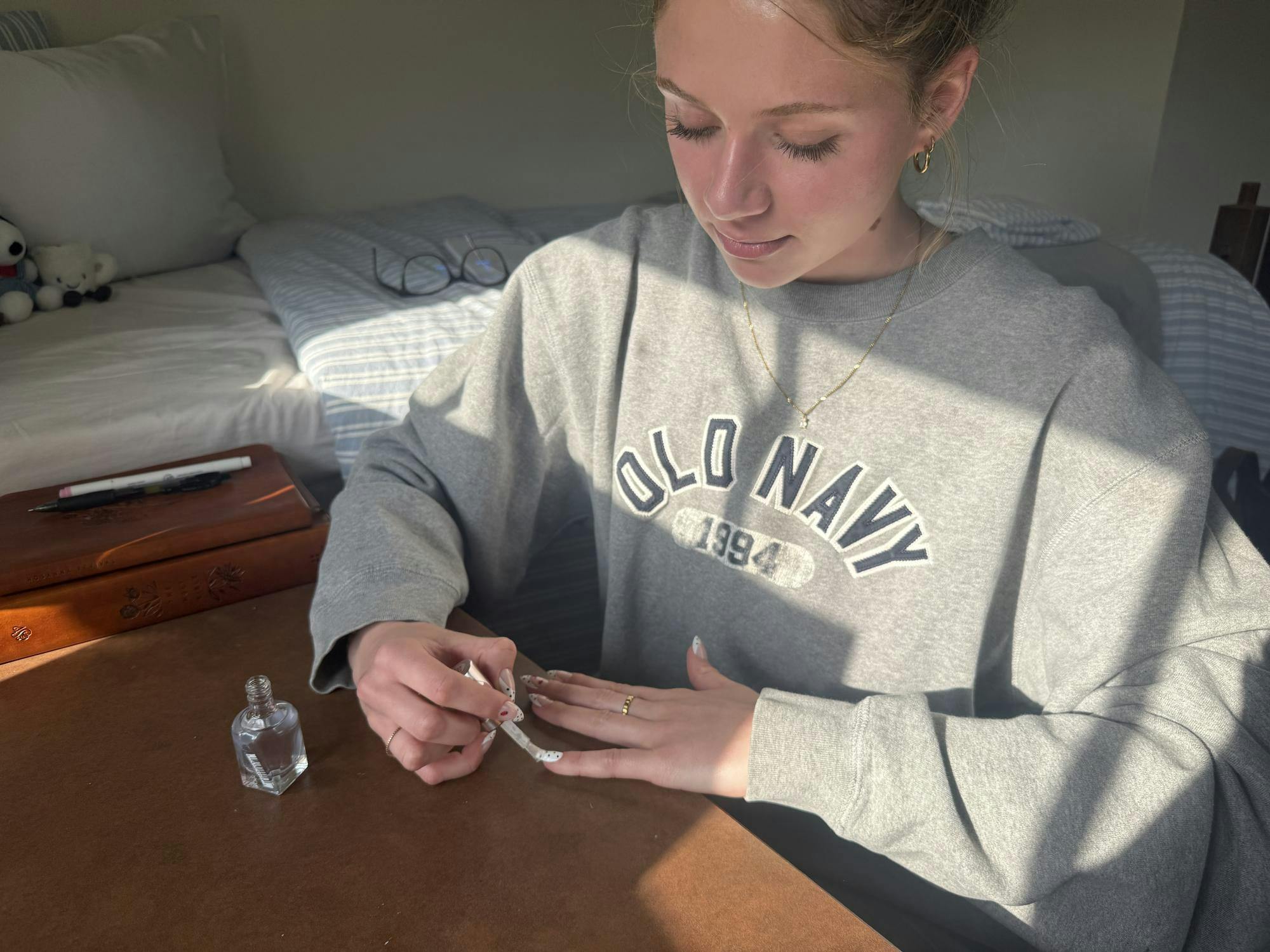 Kenzi Perkins doing her nails in her dorm room. Photo provided by Kenzi Perkins.