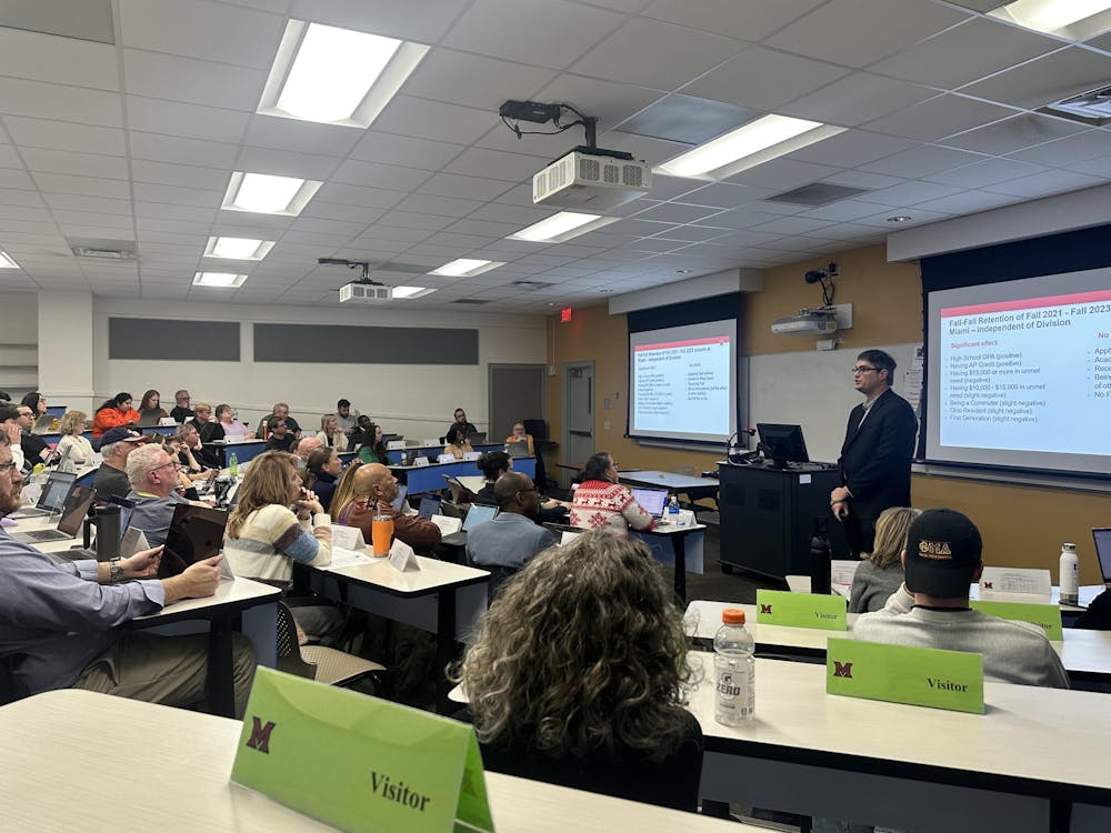 Steve Graunke discusses admission statistics with the University Senate at its Dec. 2 meeting.