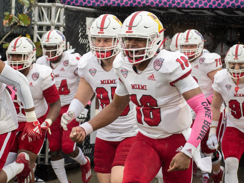 The RedHawks storm the field as the rain keeps pouring down