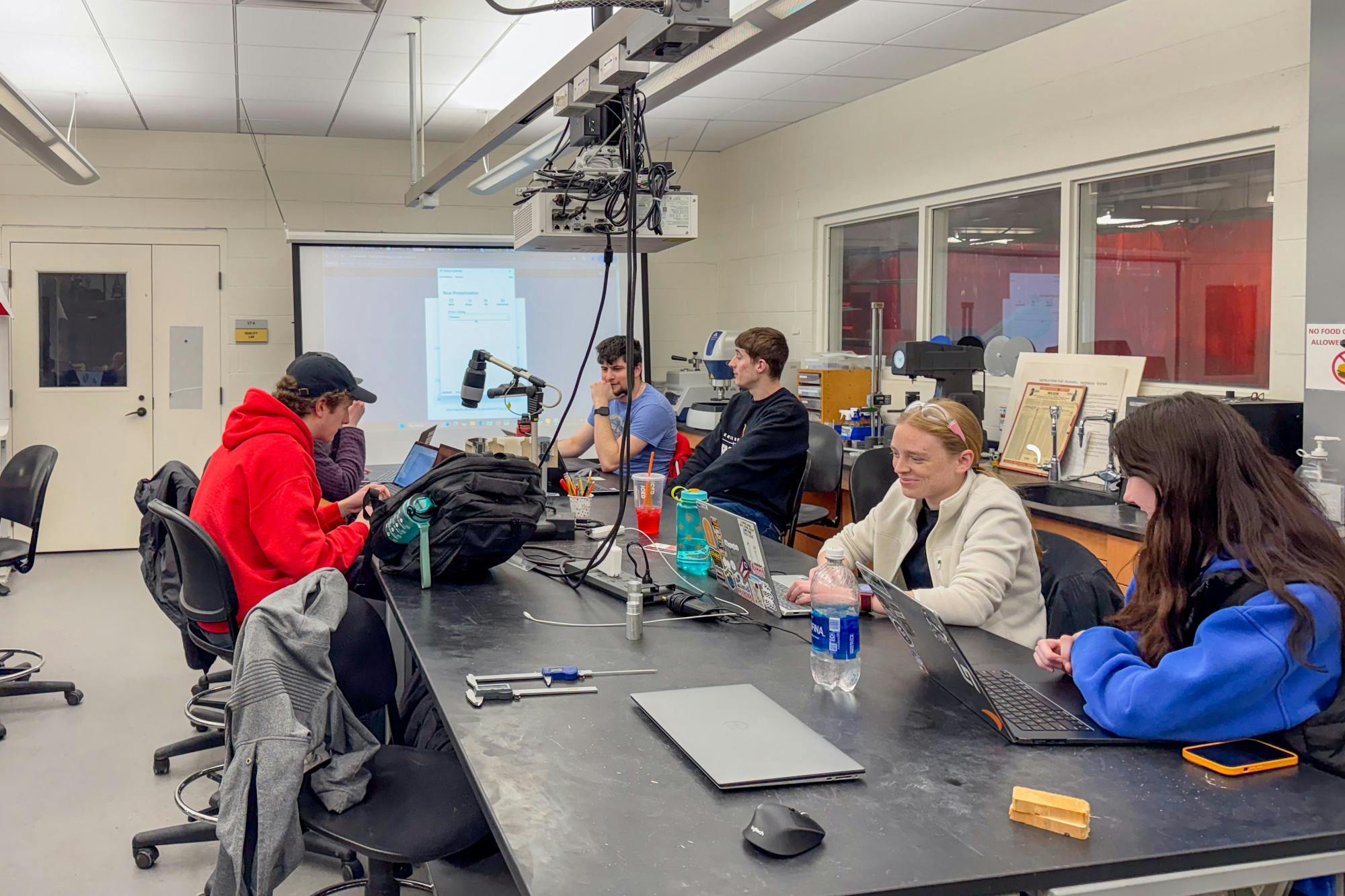 Members of RedHawk Racing working in the Engineering Building on Feb. 24