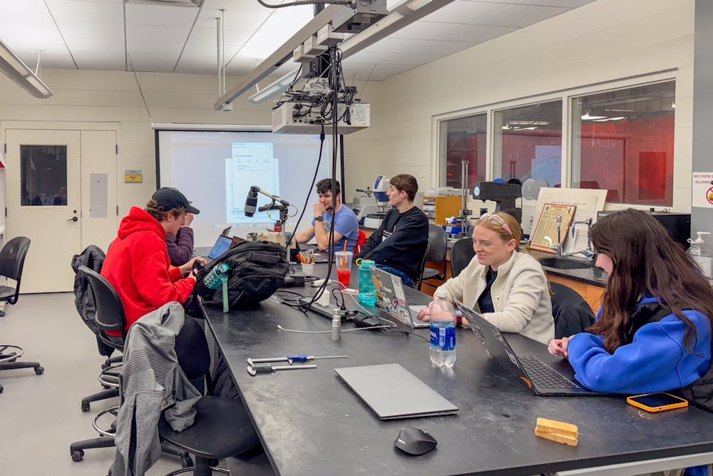 Members of RedHawk Racing working in the Engineering Building on Feb. 24