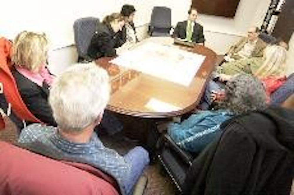 Several Oxford residents meet with Boehner representative Mike Jackson Thursday in a conference room of the Municipal Building.