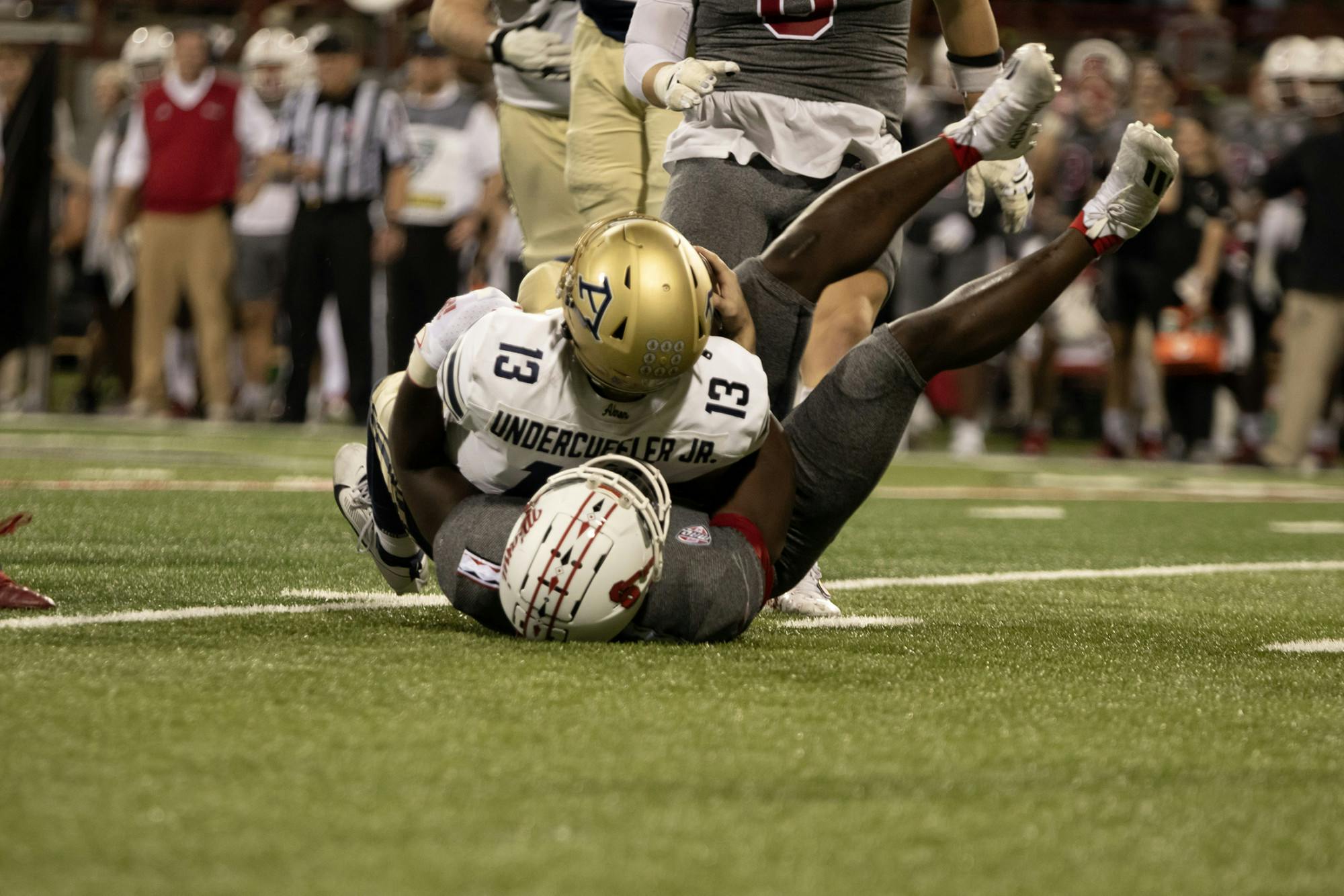 Brian Ugwu sacks Akron quarterback Jeff Undercuffler Jr. late in the third quarter, killing the drive in a shutout for the RedHawks.