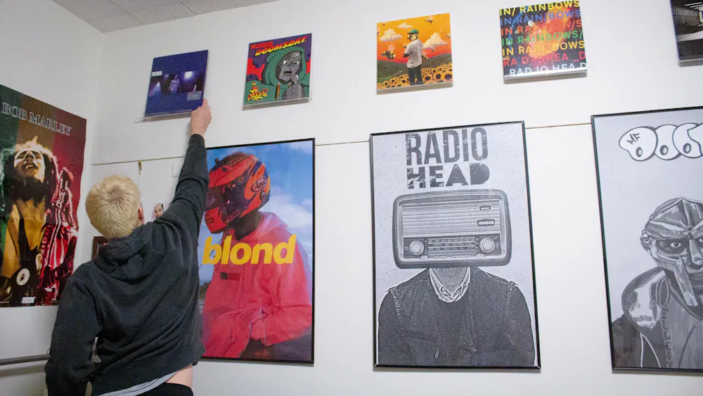 Sami Lacksonen adding the Dummy album by Portishead to his wall collection