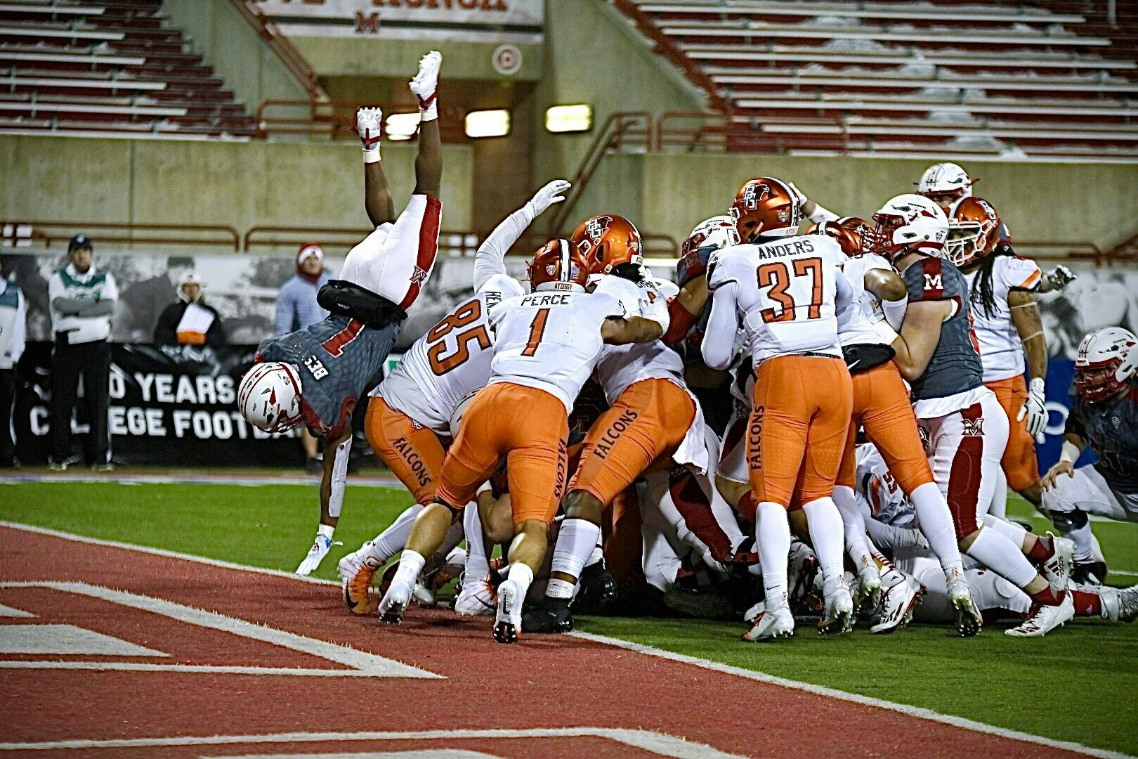 Junior running back Jaylon Bester flips into the end zone for a touchdown during Miami&#x27;s 44-3 rout of Bowling Green Wednesday at Yager Stadium.