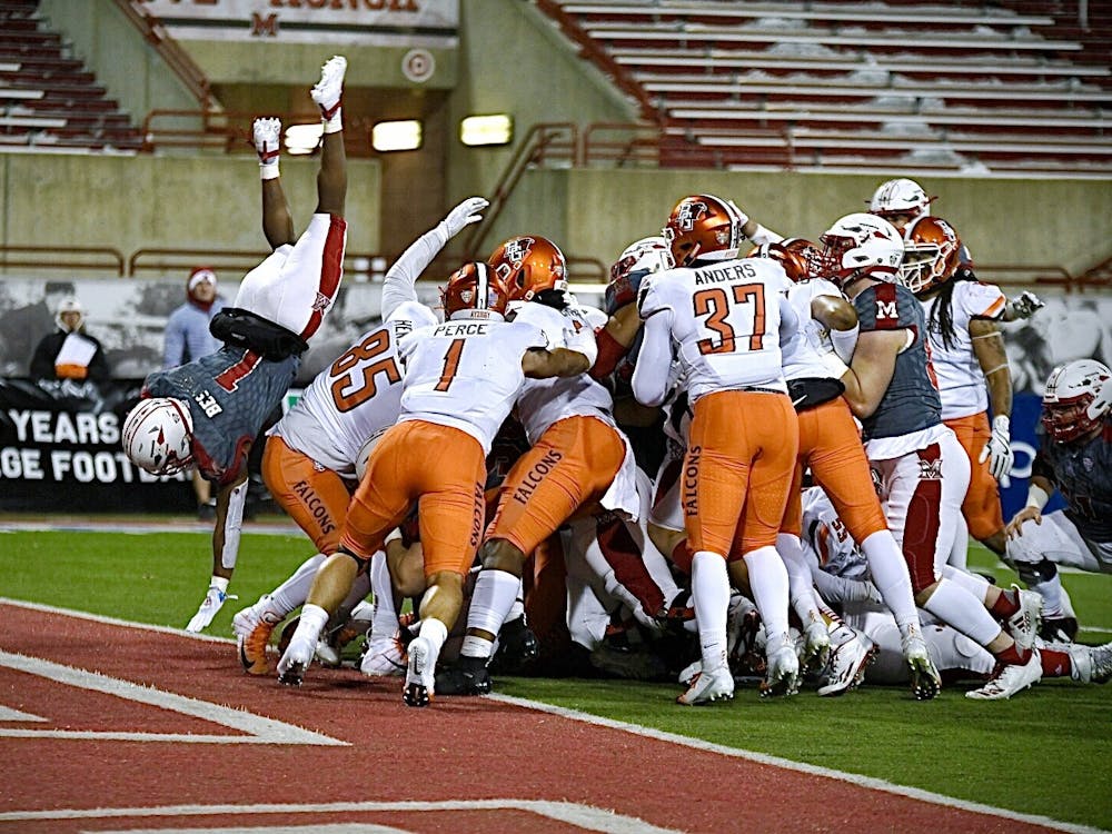 Junior running back Jaylon Bester flips into the end zone for a touchdown during Miami&#x27;s 44-3 rout of Bowling Green Wednesday at Yager Stadium.