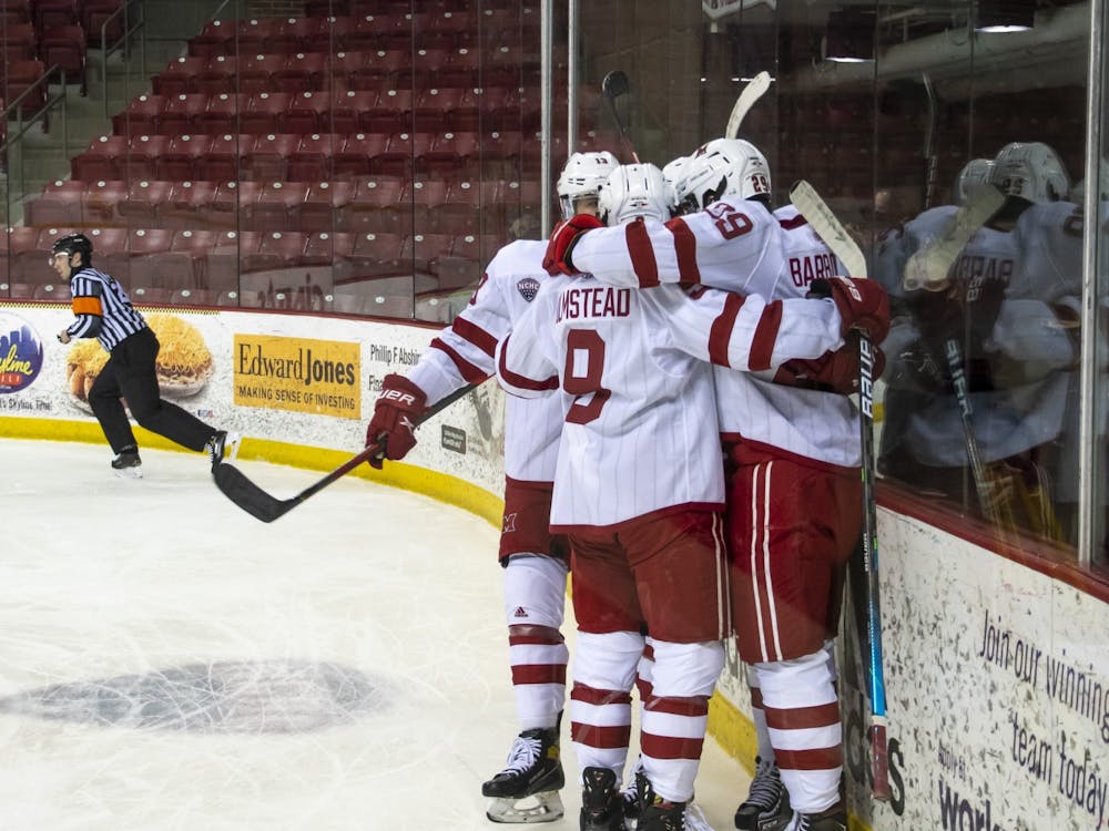 Several RedHawks celebrate a goal during a Feb 13 loss to St Cloud State