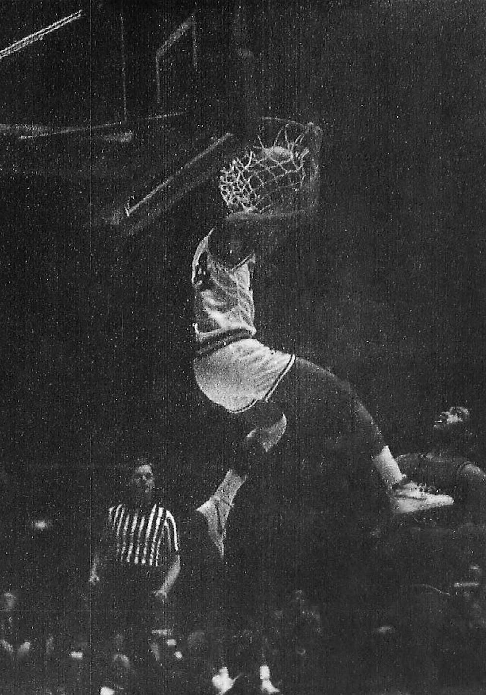 Ron Harper dunks during the game against Northern Illinois on Jan. 19, 1985