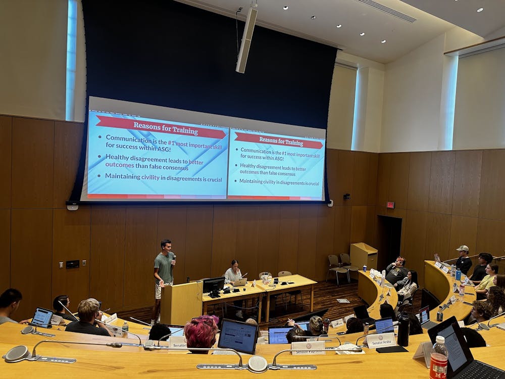 Speaker Pro Tempore Nick Barry provides a presentation on ethical communication train to members of ASG during their weekly meeting on Sept. 23 in the Joslin Senate Chamber.