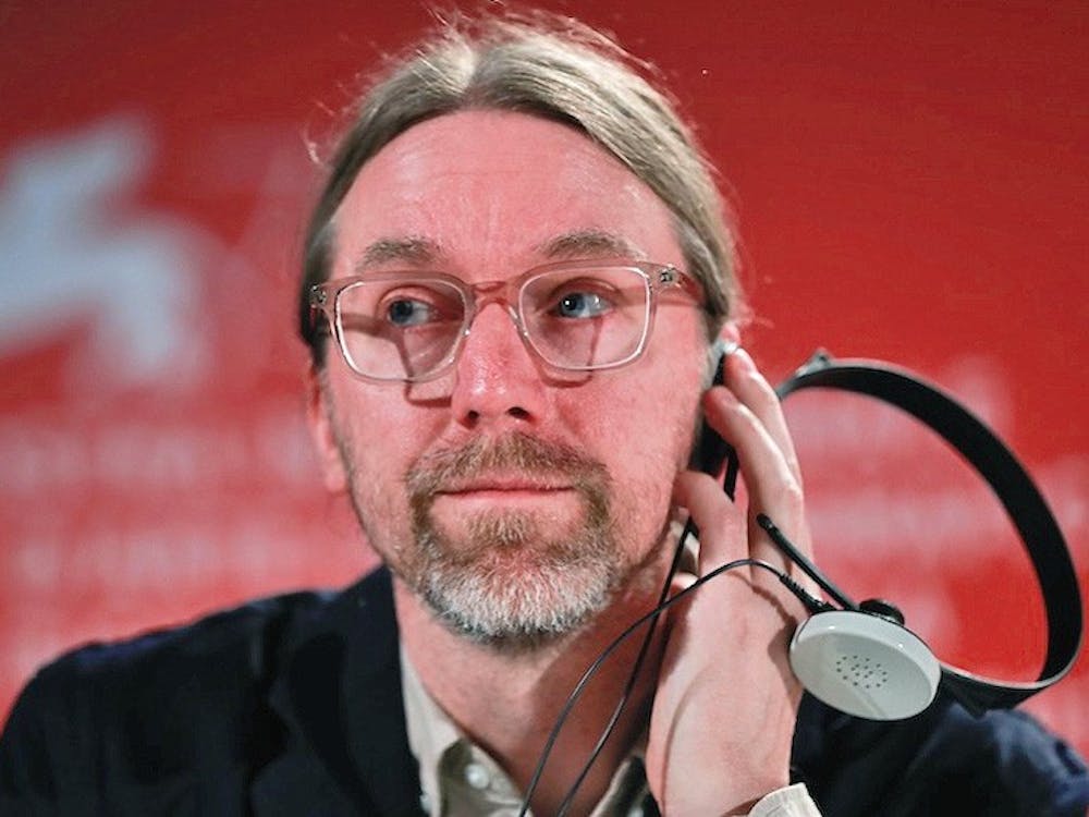 Kajganich on a panel at the Venice Film Festival.