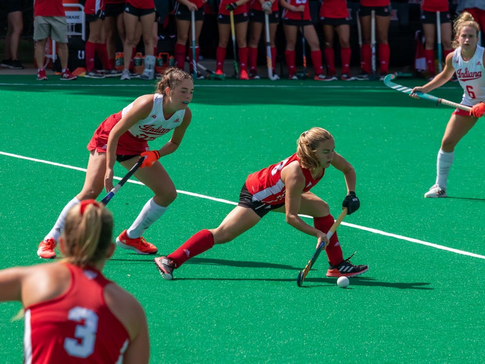 Junior midfielder Luli Rosso (middle) passes the ball to a teammate in Miami's 1-0 home loss to Indiana University.