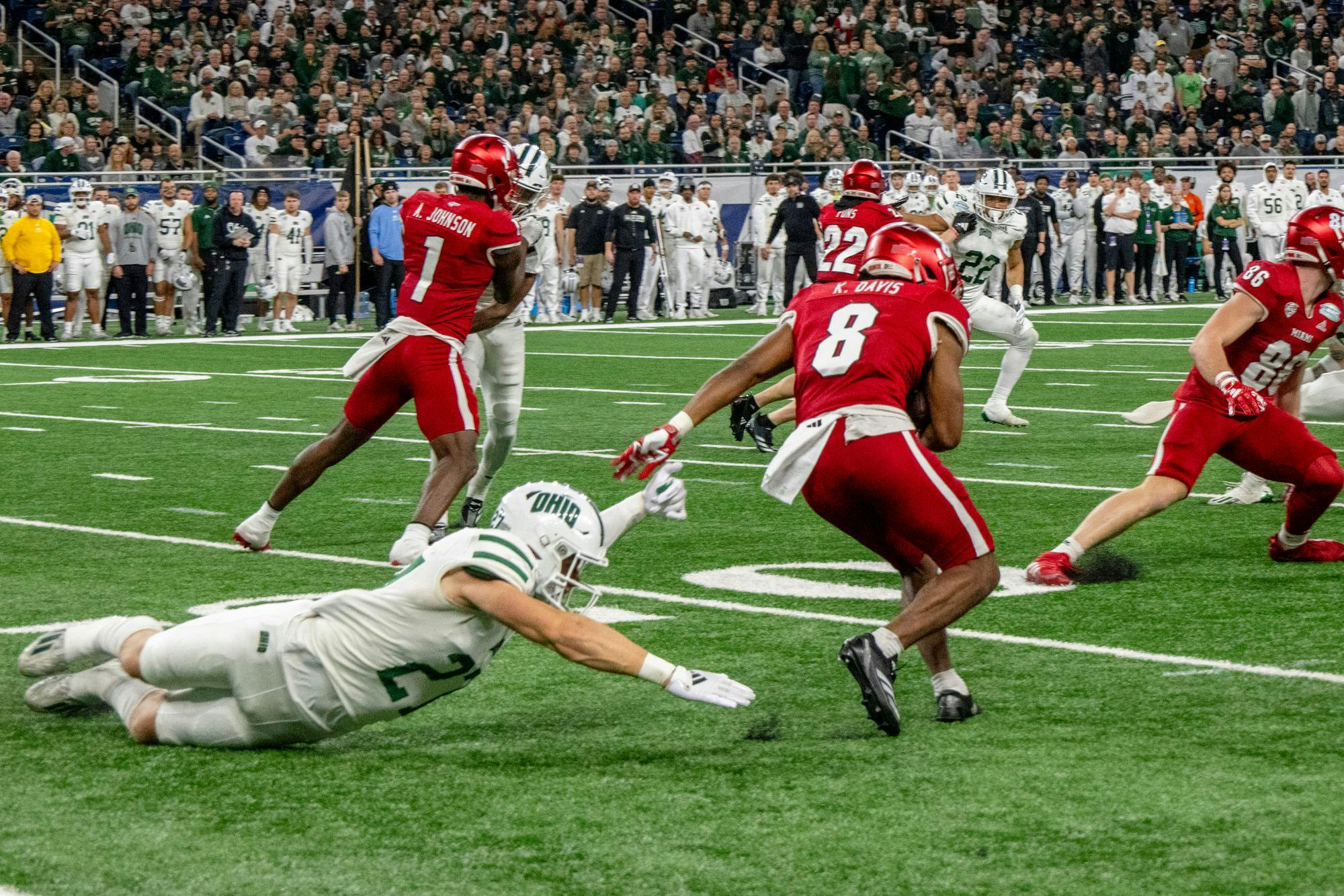 The RedHawks rush against the Bobcats at Ford Field in the 2024 MAC championship