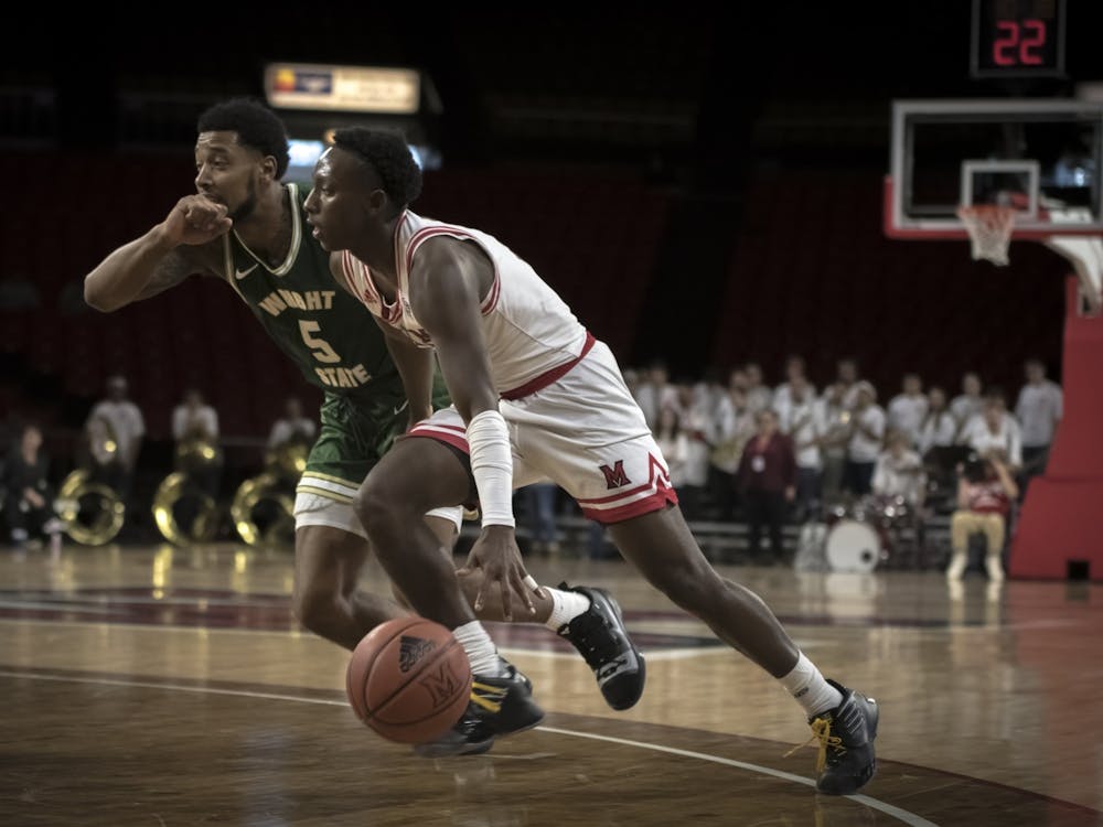 Isaiah Coleman-Lands drives past a Wright State defender during Miami's season-opening loss to the Raiders on Nov. 9, 2019. Coleman-Lands averaged eight points per game during the 2019-20 season.