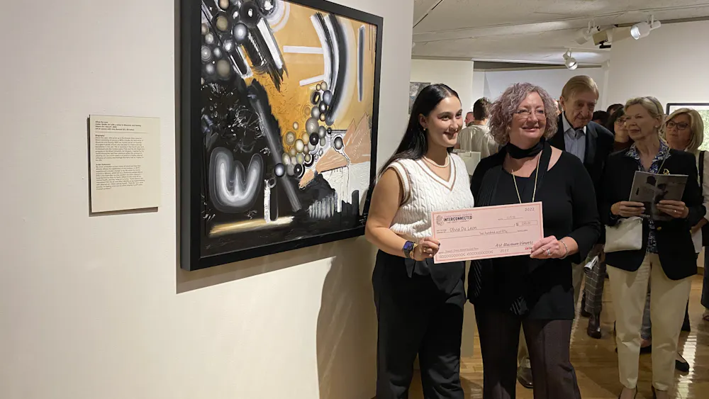 Olivia De Leon won second place for her oil painting named “Where Do I Stand?”