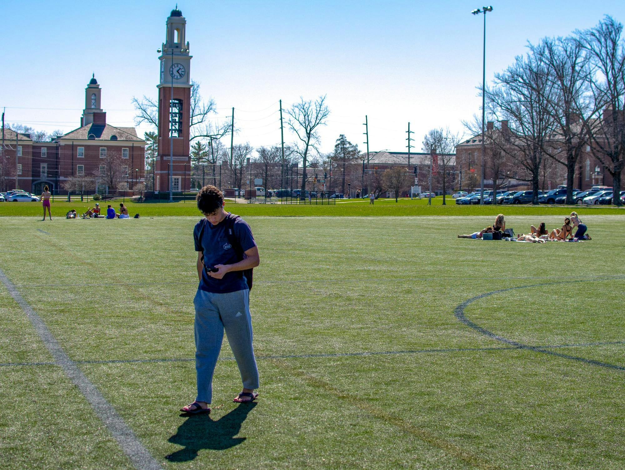 Students relax on Cook Field last spring semester, before the area was permanently closed.