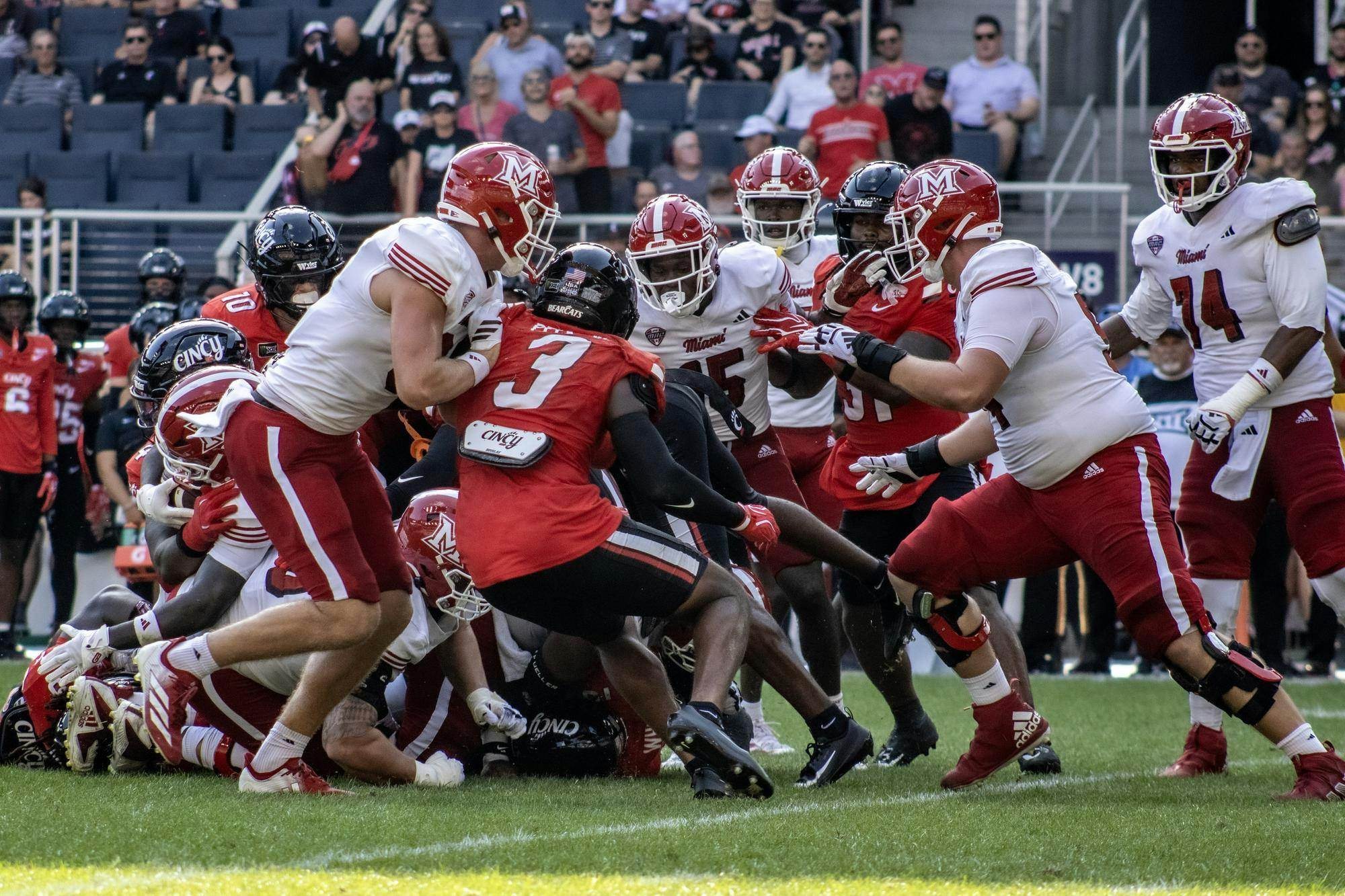 Miami battles UC in the Battle for the Victory Bell on Sept. 19