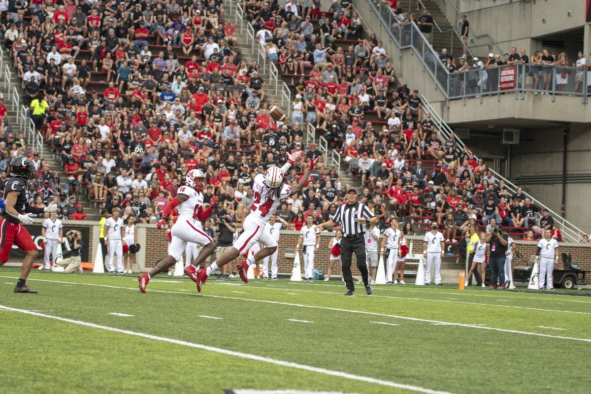 Junior defensive back Ja&#x27;don Rucker-Furlow stretches out for a potential interception in Miami&#x27;s 49-14 loss to Cincinnati.
