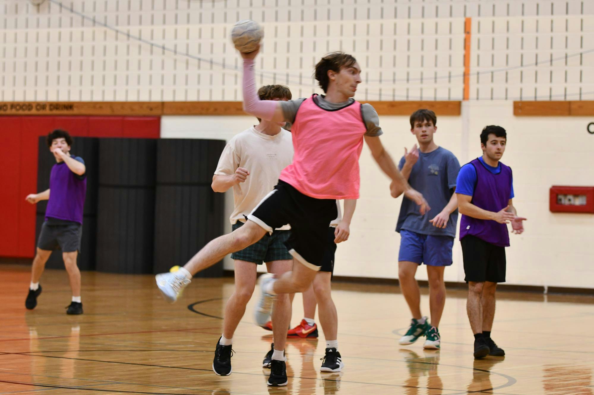 Andy Kraus goes for a shot during practice with the club handball team at Phillips Hall on Oct. 20