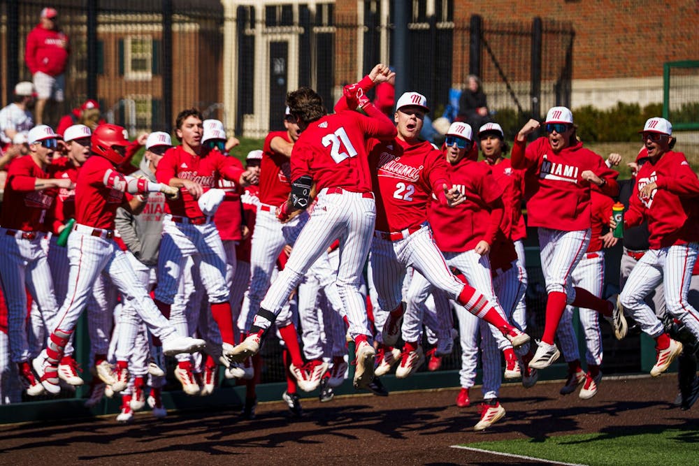 <p>The Miami University RedHawks baseball team celebrates after a 9-4 victory over the Eastern Michigan Eagles on March 8</p>