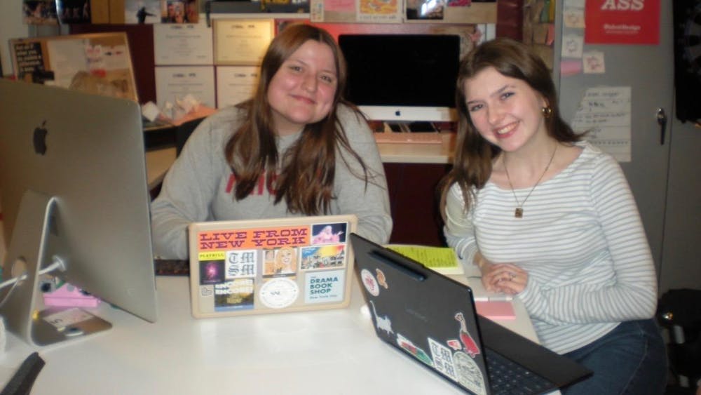 Culture Editor Stella Powers (left) works in The Miami Student Newsroom on production night alongside Assistant Culture Editor Ayla Peden. Photo provided by Stella Powers.