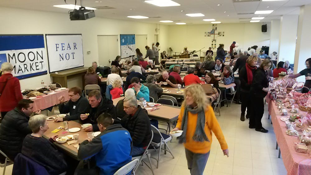 Oxford residents enjoy a chili lunch for MOON Co-op Market, held at Holy Trinity Episcopal Church. 