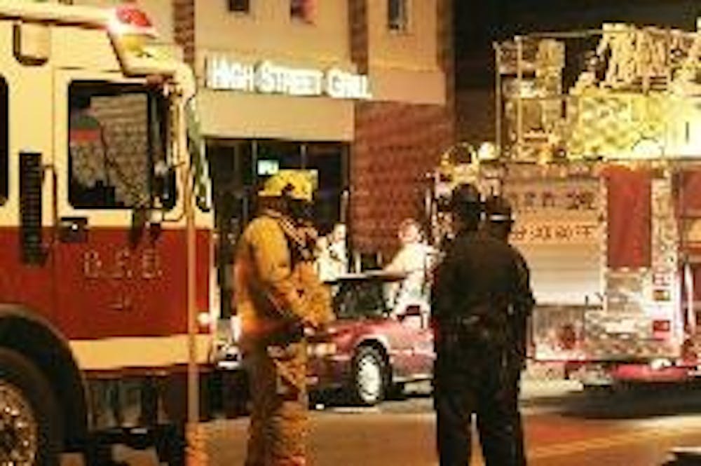 The Oxford Fire Department responds to the kitchen fire Friday night at High Street Grill uptown.  No one was injured in the incident.