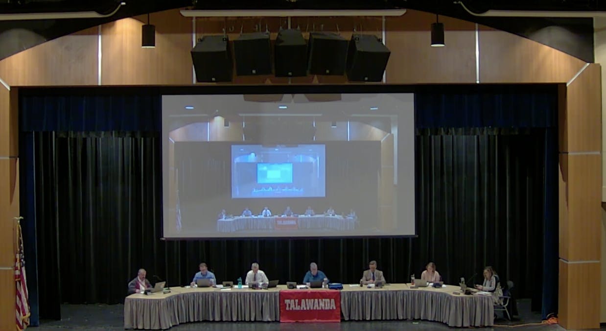 The Talawanda School Board meets in the high school’s Performing Arts Center once a month with members David Bothast, Pat Meade, Rebecca Howard, Chris Otto and Dawn King, along with superintendent Ed Theroux and treasurer Shaunna Tafelski.
