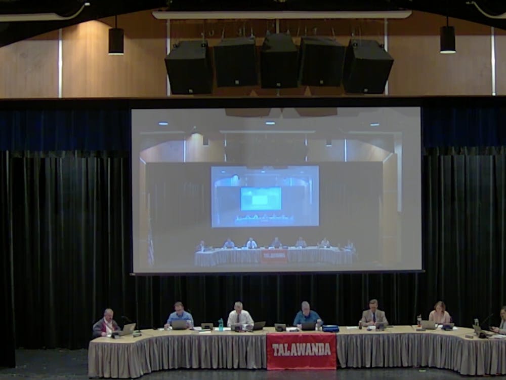 The Talawanda School Board meets in the high school’s Performing Arts Center once a month with members David Bothast, Pat Meade, Rebecca Howard, Chris Otto and Dawn King, along with superintendent Ed Theroux and treasurer Shaunna Tafelski.