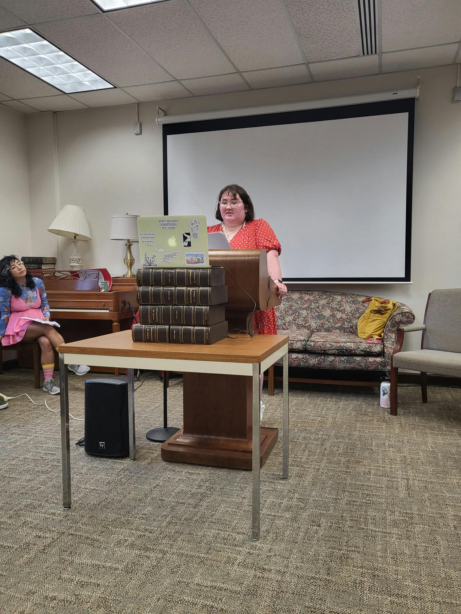 Poet Hallie Fogarty reads her writing at the first OxMag Spring Street Reading Series event of 2023.