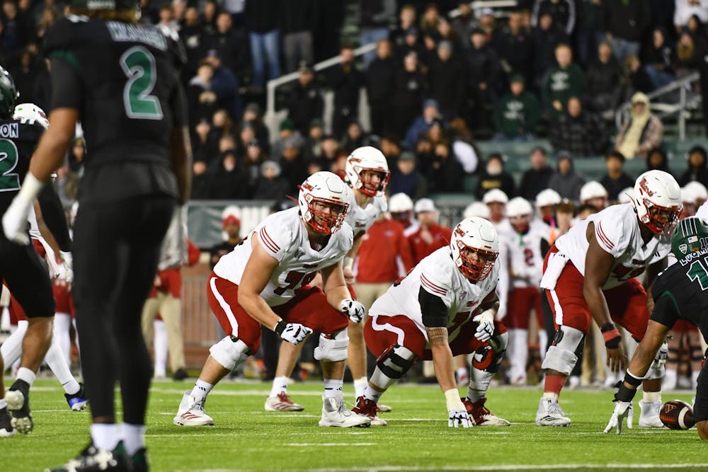 Miami's offensive line prepares for a snap in the second quarter at Peden Stadium on Nov. 4