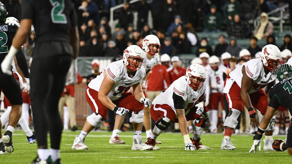 Miami's offensive line prepares for a snap in the second quarter at Peden Stadium on Nov. 4