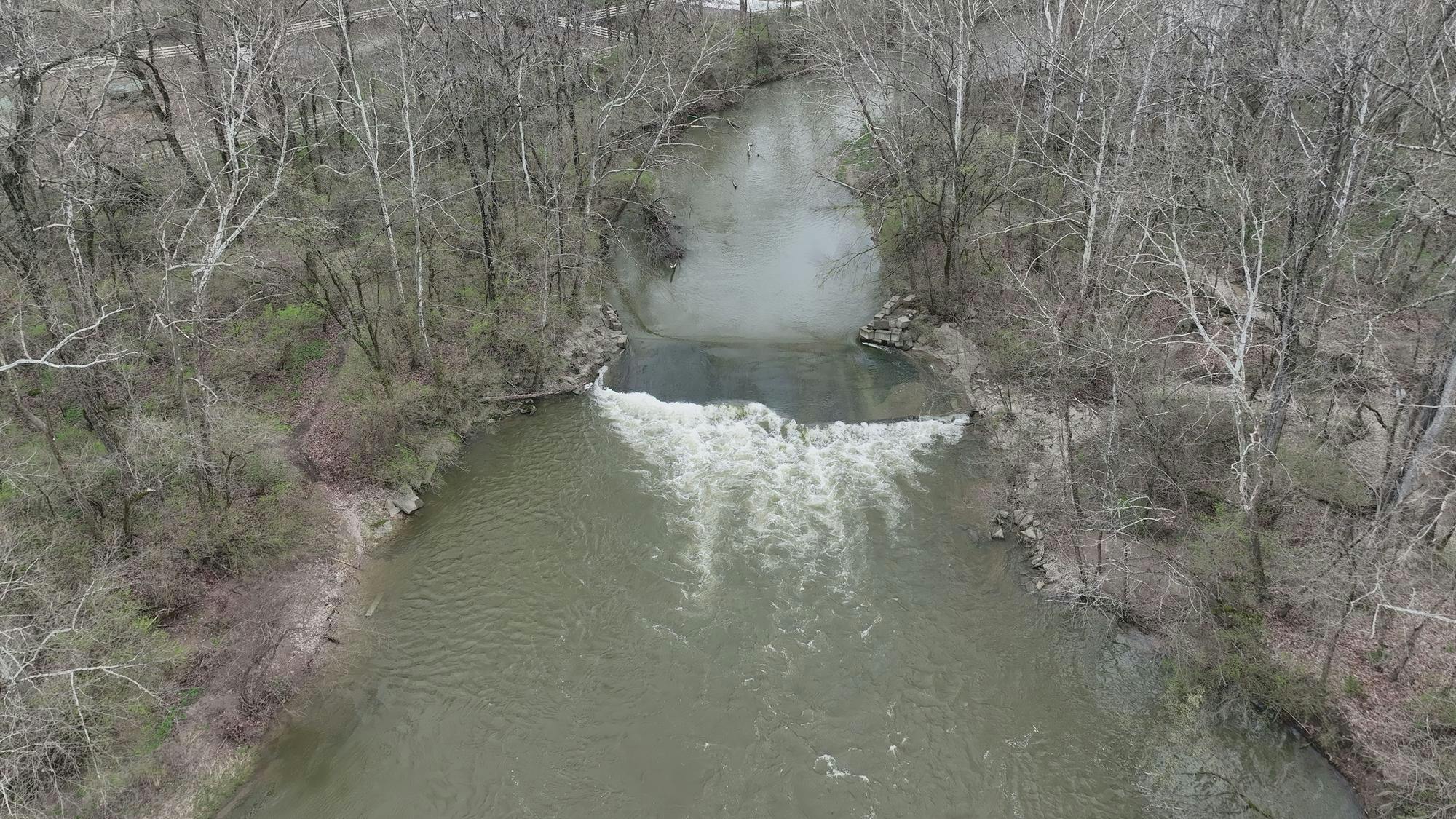 Water flows near the Four Mile Creek dam. 