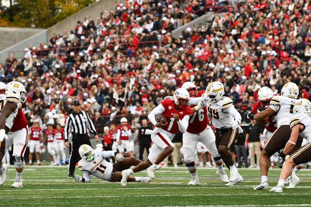 Seventh-year quarterback Dequan Finn takes off for a scramble against Western Michigan at Yager Stadium on Oct. 25