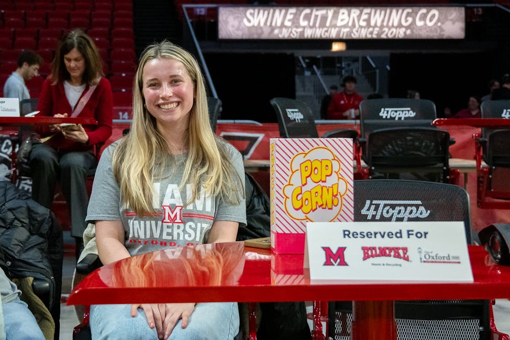 <p>Sustainability Engagement Coordinator ﻿Alex Miller at the recent Miami men&#x27;s basketball game.</p>