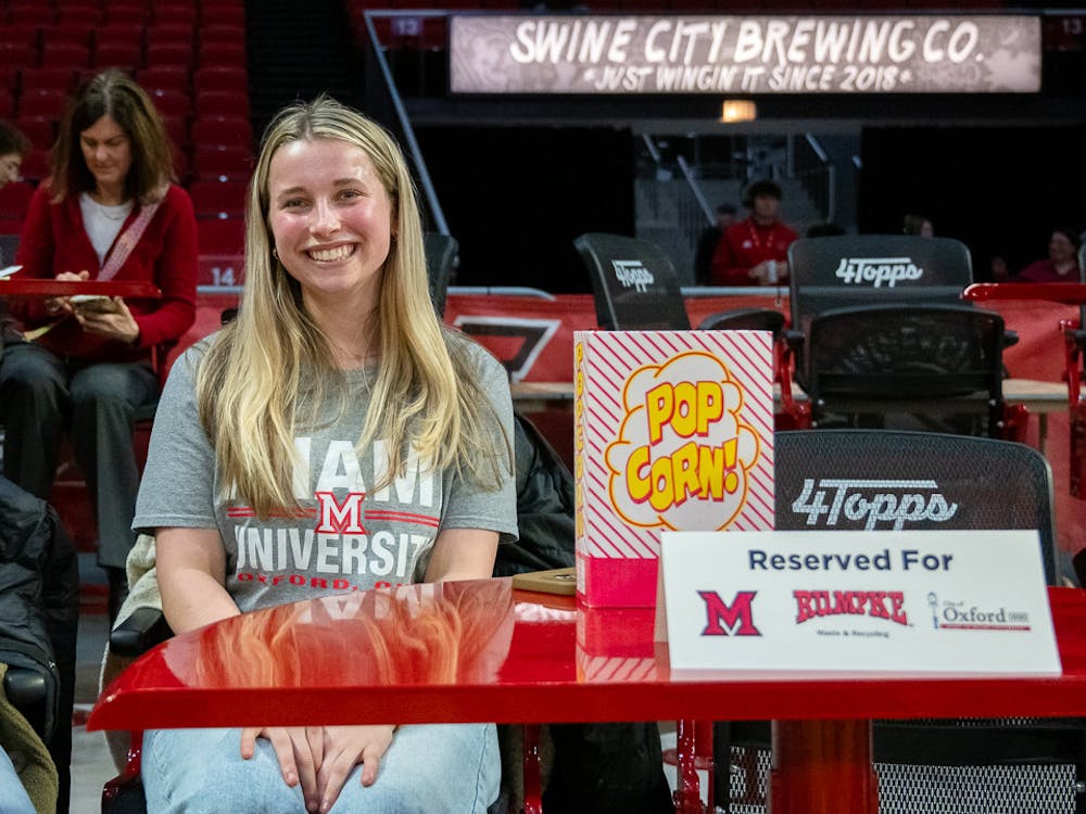 Sustainability Engagement Coordinator Alex Miller at the recent Miami men's basketball game.