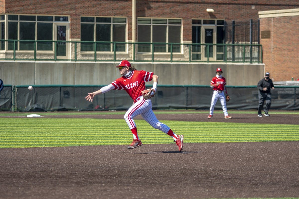 Graduate student second baseman Will Vogelgesang flips the ball to first base during Miami&#x27;s weekend series vs Toledo