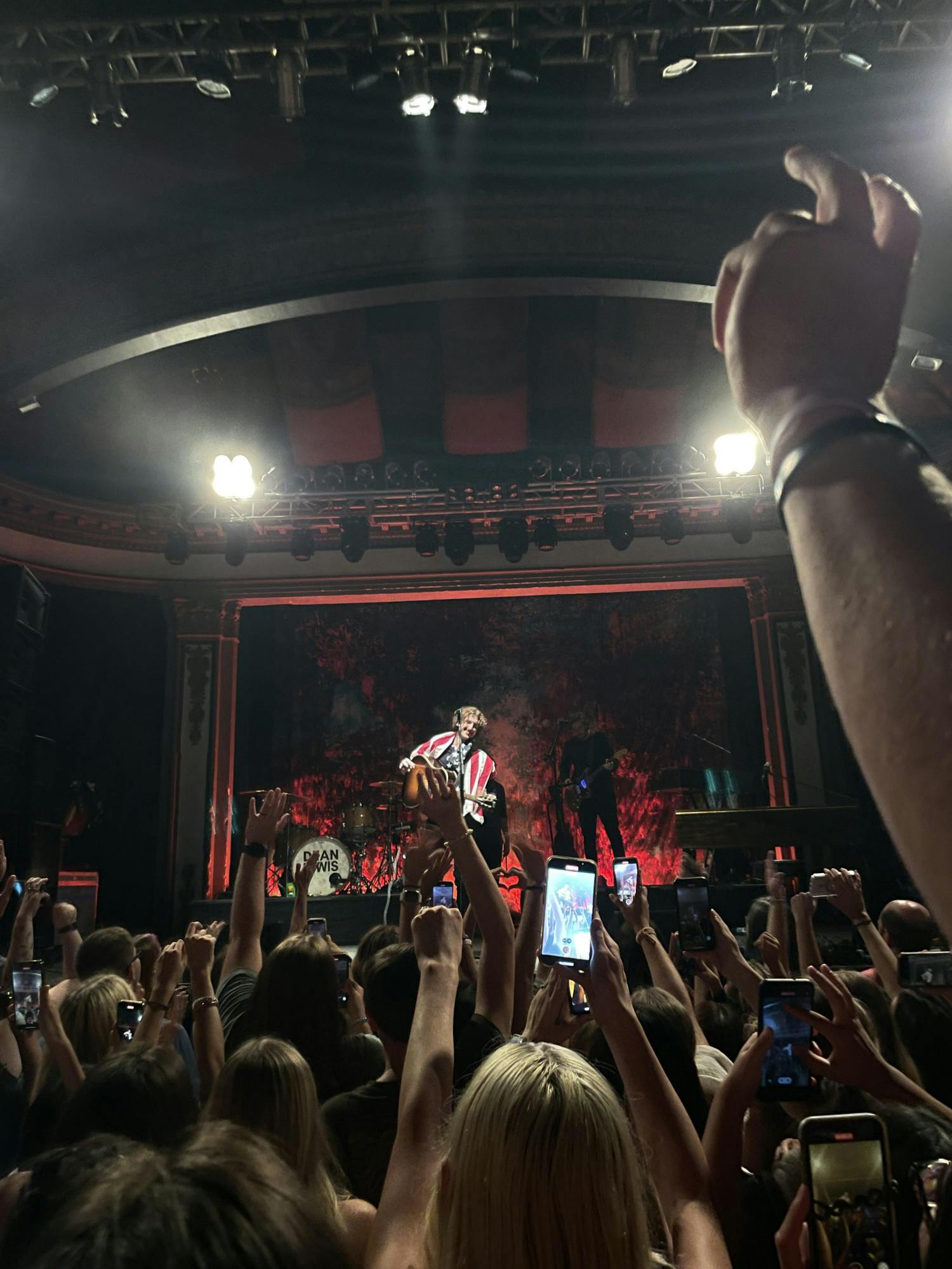 Fans put their hands in the air as Dean Lewis performs at the Newport Music Hall.