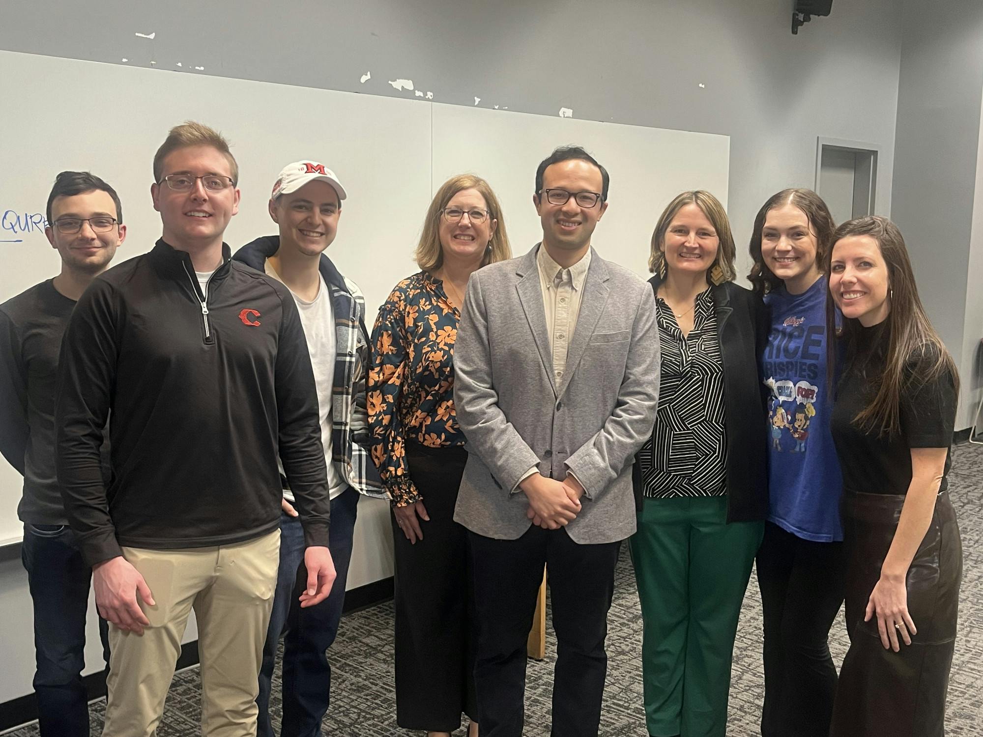 Jorge Merlos takes a photo with Miami Spanish majors on Feb. 4