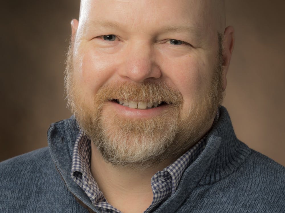 Brian Henebry accepted a Top 100 CIO award on behalf of Miami University for its partnership with Tri-Health for contact tracing during the pandemic.