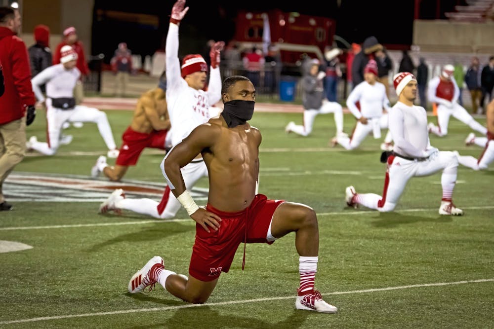 <p>Despite temperatures hovering around 25 degrees at Yager Stadium, several RedHawks stretched shirtless before a 44-3 victory over Bowling Green on Nov. 13, 2019.</p>