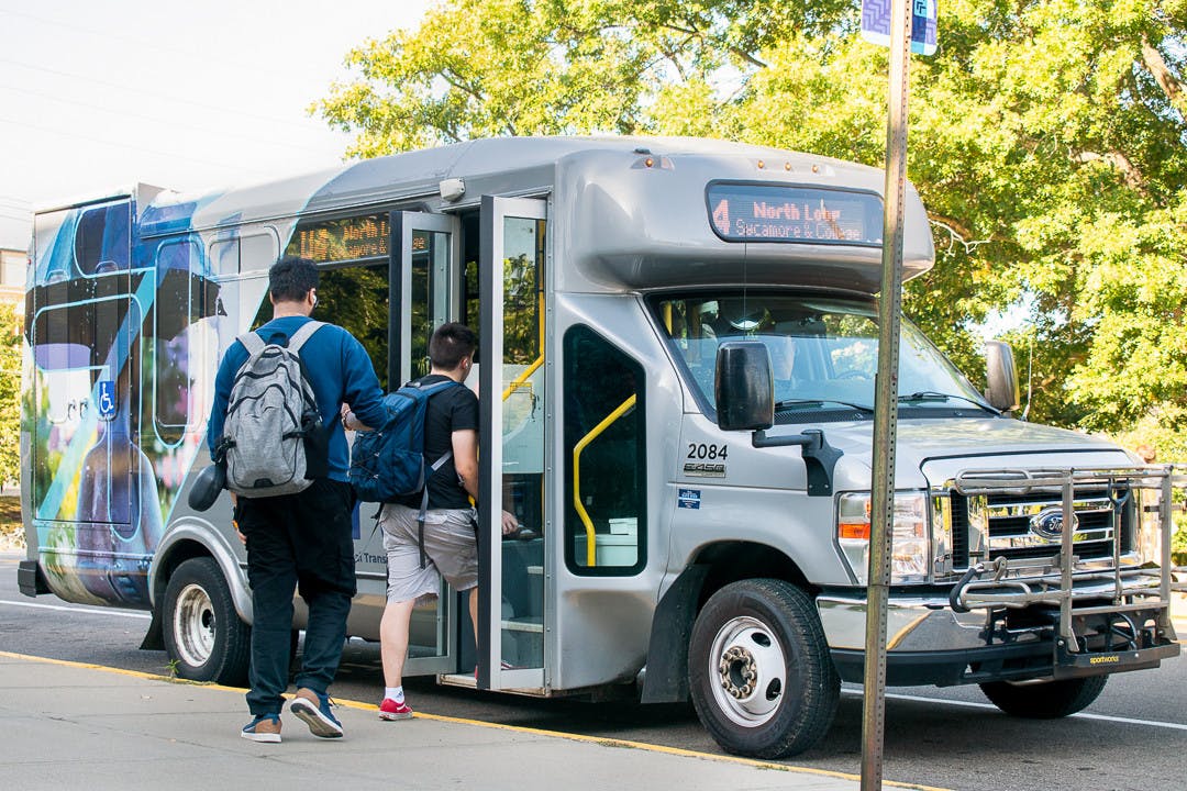 Miami students get on the BRCTA bus at the Miami Station stop.