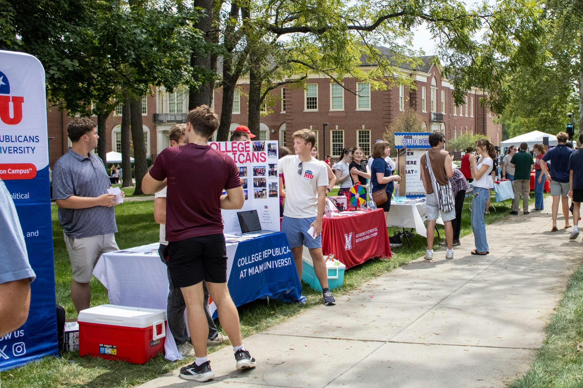 College Republicans and College Democrats table at the 2026 Mega Fair in academic quad.