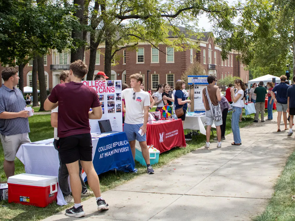 College Republicans and College Democrats table at the 2026 Mega Fair in academic quad.