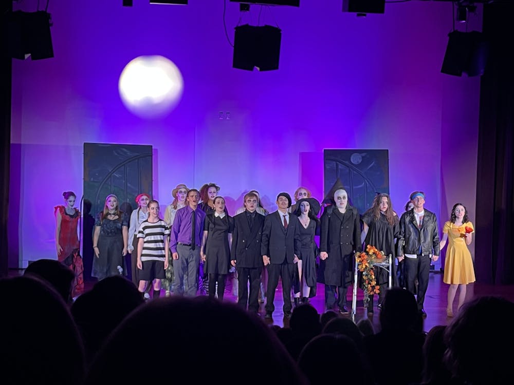 The cast of Stage Left’s “The Addams Family” sings together in one of the show’s musical numbers.