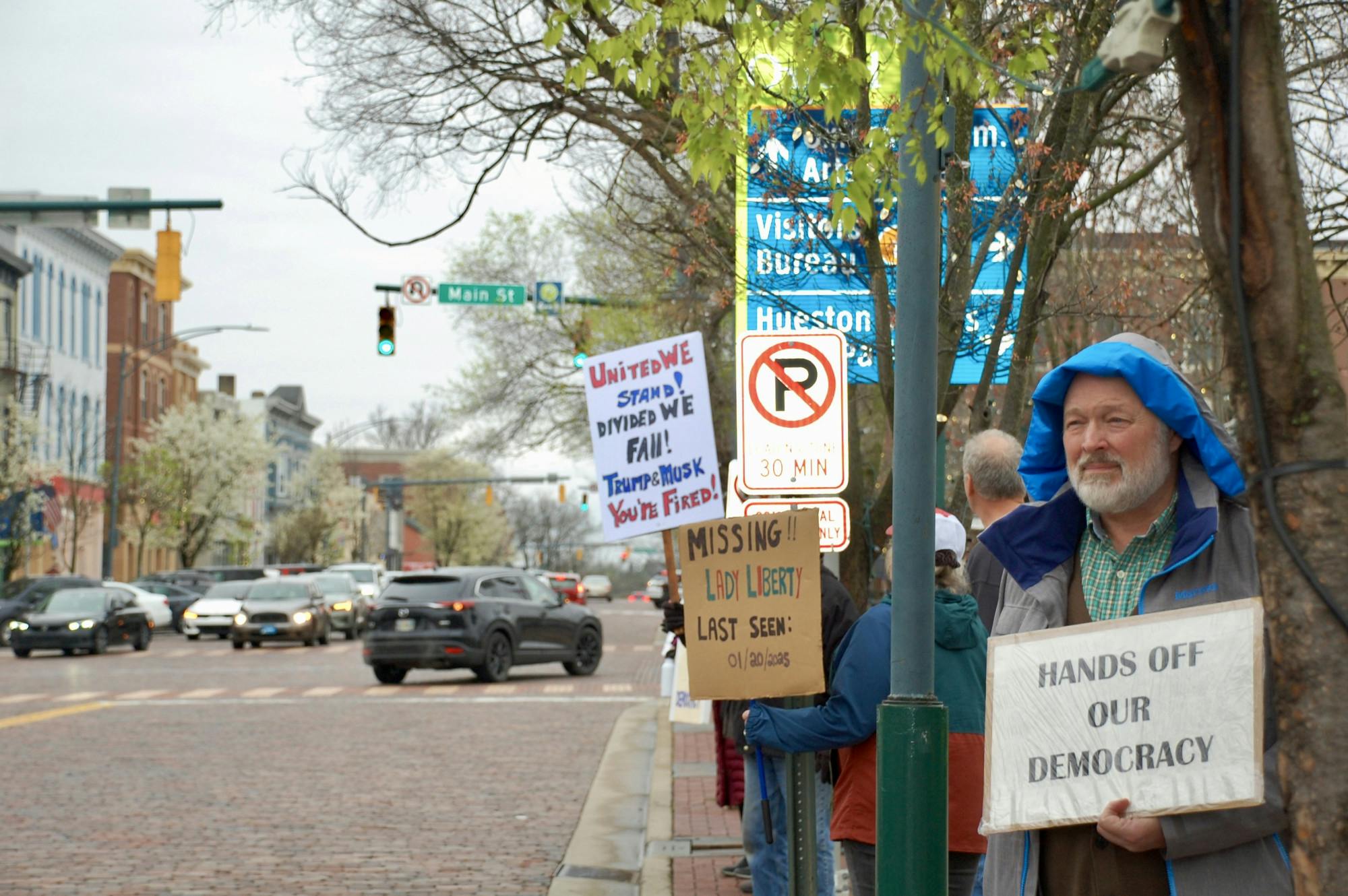 People lined the sidewalks around Oxford Memorial Park.