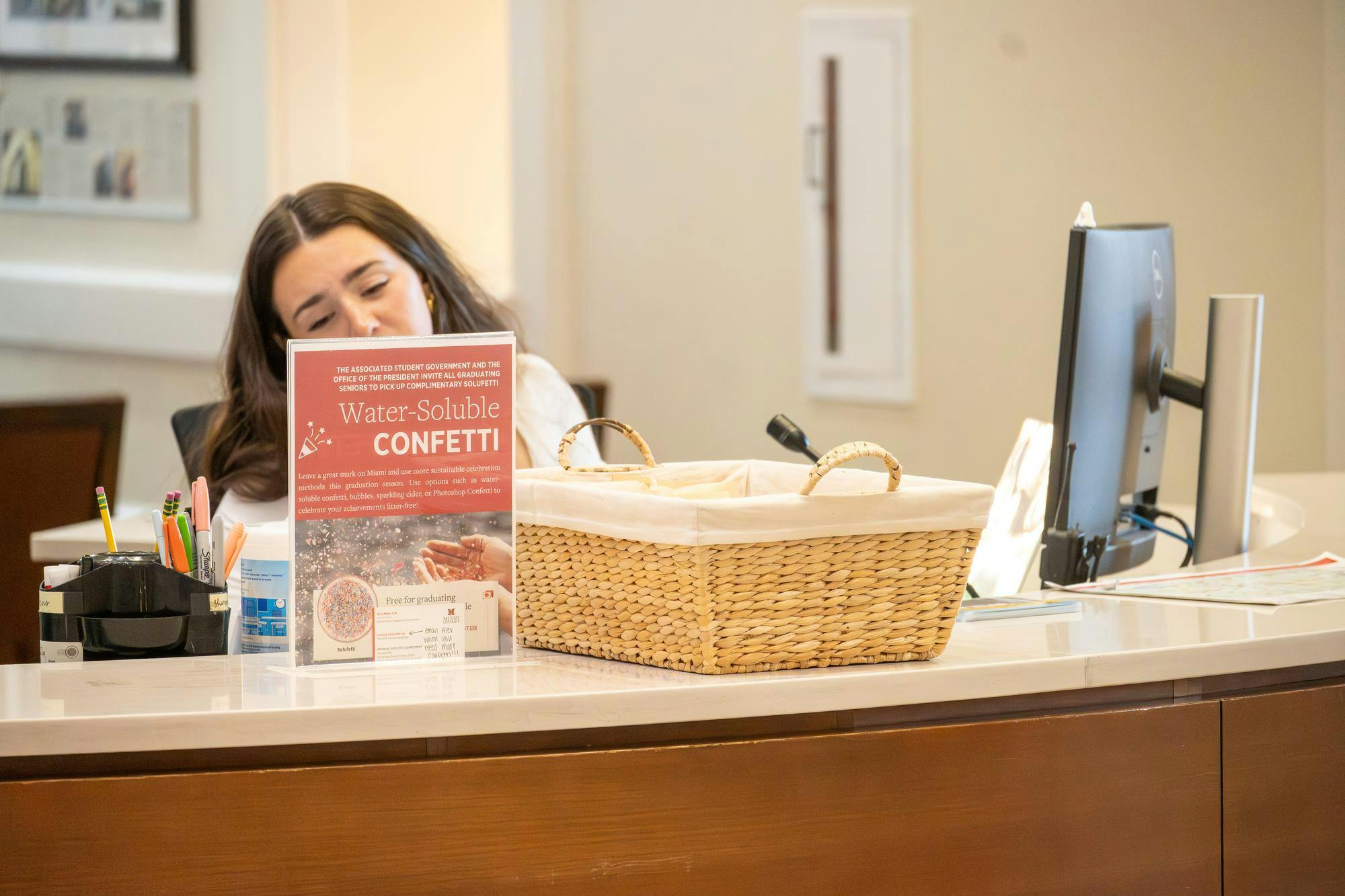 A basket of water-soluble confetti sits out at Armstrong Student Center information desk.
