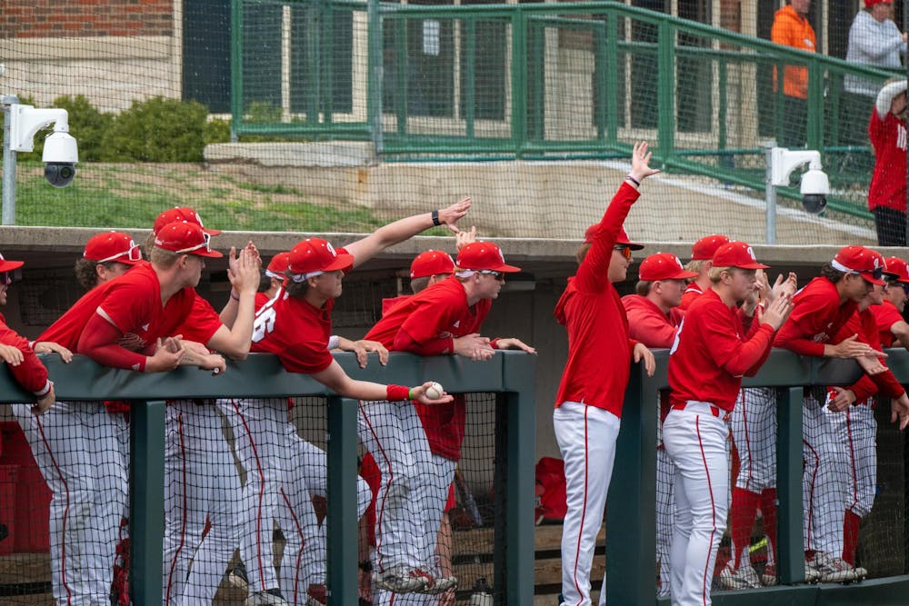 The Miami baseball team applauds and cheers in dugout during game against Kent State at McKie Field on April 13, 2025. 

