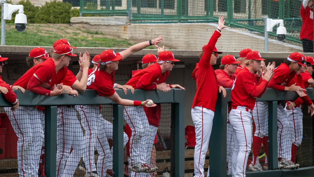 The Miami baseball team applauds and cheers in dugout during game against Kent State at McKie Field on April 13, 2025.