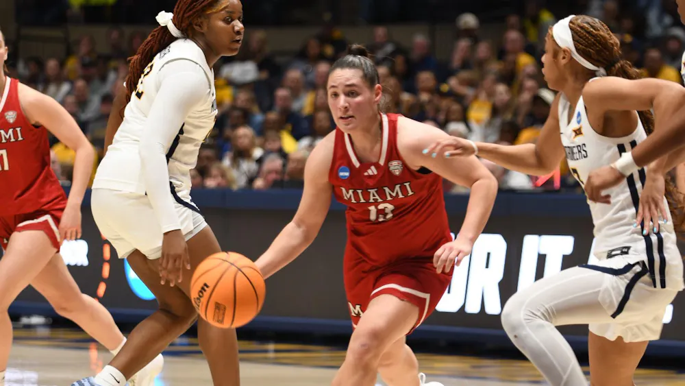Sophomore guard Tamar Singer drives for the rim against West Virginia in the first round of March Madness at Hope Coliseum