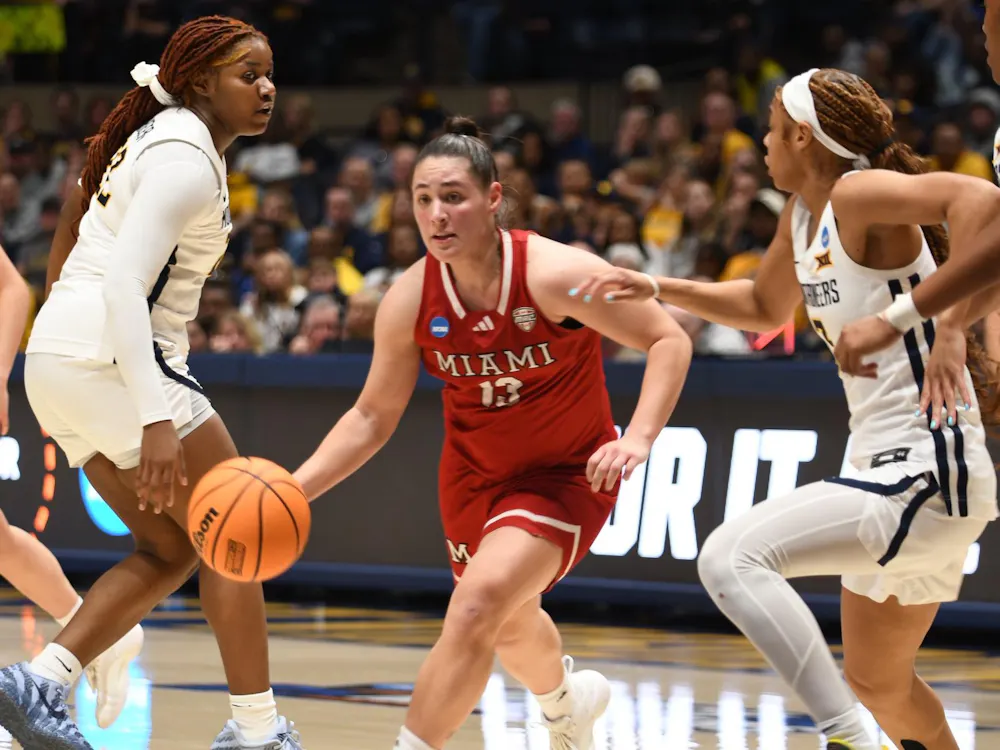 Sophomore guard Tamar Singer drives for the rim against West Virginia in the First Round of March Madness at Hope Coliseum